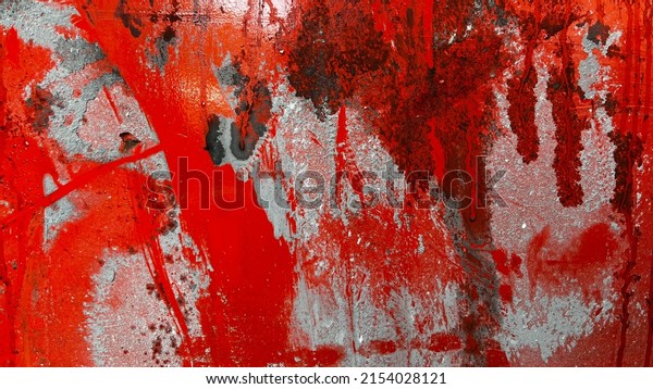 Scratches of the car\'s\
paint that are red.