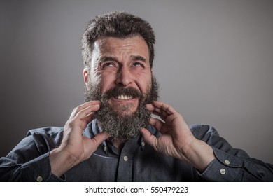 Scratching Face With Both Hands, Huge Beard Portrait, Mature Adult Caucasian Man