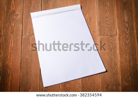 scratchpad over worn-out tables