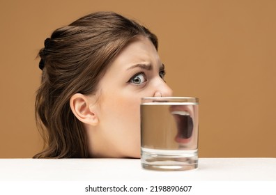 Scream. Weird Emotions, Facial Expression Concept. Modern Art Photography. Beautiful Girl's Face Through Glass Of Water. Object Distortion, Optical Illusion. Minimalistic Contemporary Art. Poster