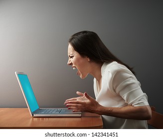 Screaming Angry Woman With Laptop