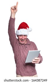 Screaming Old Casual Man With Santa Hat Is Winning While Holding A Tablet On White Background