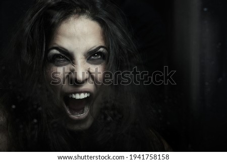 Similar – Angry and aggressive young woman