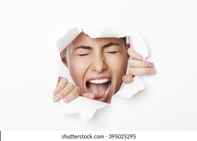 Screaming Woman Trapped Behind White Paper