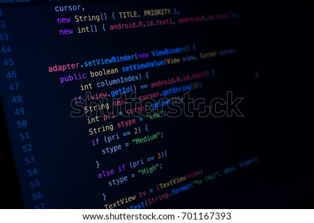 Screen of android application developing java code on dark background