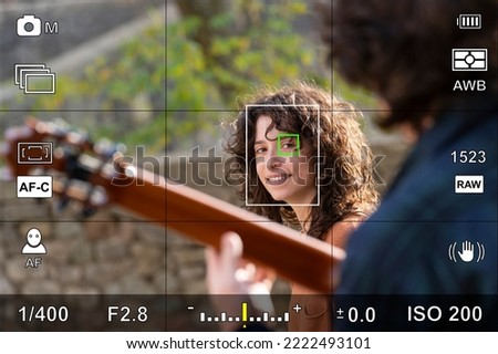 Screen or camera viewfinder with the photographic settings of a portrait photo