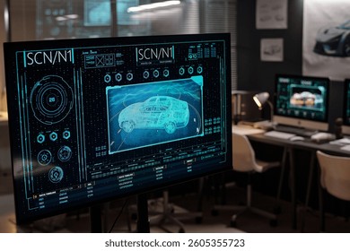 Screen of computer with three dimensional car prototype developed in engineering bureau or automotive design studio
