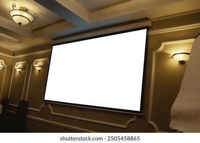Screen display for creative design, advertisement free space. Large projection screen on beige wall, presentation board, blank whiteboard on conference. Advertising mockup concept. Copy ad text space