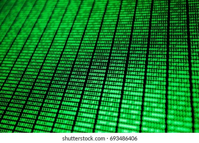Screen filled with green lines of binary code