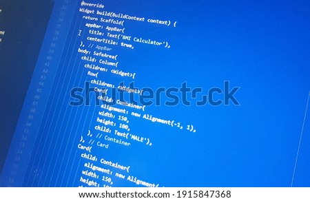 Screen of flutter application developing code. Lines of code on computer screen abstract