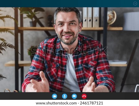 Screen headshot view of smiling middle age business man male employee worker coach speaking having zoom call, online meeting in home office. Video conferencing concept, remote working