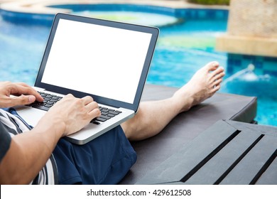 Screen Mockup Of Laptop That A Man Is Using In The Pool On Vacation - Work Anywhere And Internet Work Concept