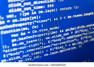 Screen of web developing javascript code. Freeware open source project. Website design. Javascript functions, variables, objects. Coding hacker concept. IT coding on monitor screen. 