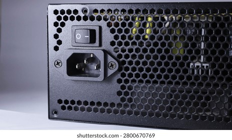 A screenshot of a computer power supply unit against a gray background. 