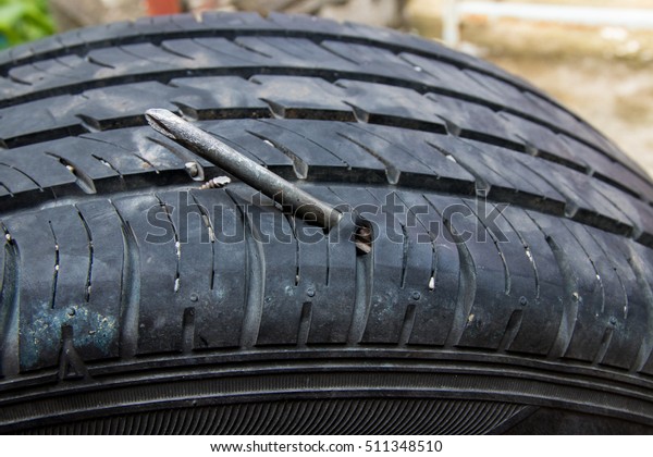 Screw Puncturing Tire, flat
tire