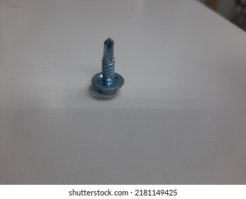 A Screw Is A Rod Or Tube With A Helical Groove On Its Surface. Its Main Use Is As A Fastener To Hold Two Objects Together, And As A Simple Machine For Converting Torque Into Linear Force. A Screw Can 