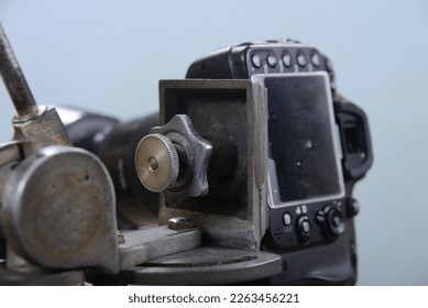 The screw type camera mount of the old camera stand.