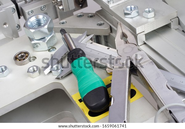 screwdriver, screw, nuts - industrial equipment\
repair set
