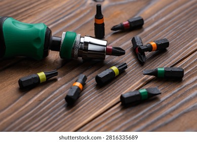 Screwdriver tips different shapes and sizes. Manual screwdriver and set of the interchangeable bits. Precision Screwdriver Kit. Steel Precision Magnetic Bits