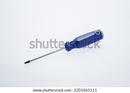 Screwdriver type TORX tip of a Torx type of screwdriver made of chrome vanadium isolated on a white background close-up