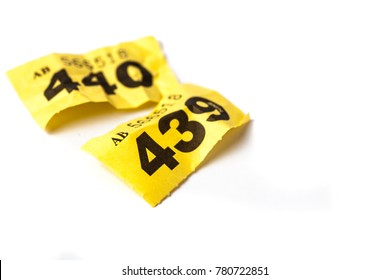 Screwed Up Yellow Raffle Ticket. Losing Number