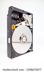 A Screwed-on Hard Disk Shows The Inner Workings Of A Hard Disk