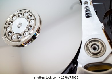 A Screwed-on Hard Disk Shows The Inner Workings Of A Hard Disk