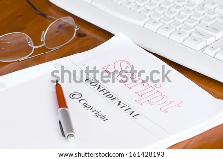 Script Screenplay on Desk with Pen and Spectacles 