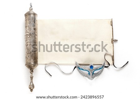 The Scroll of Esther and Purim Festival objects (masquerade mask) on white background. Top view Foto stock © 