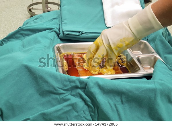 Scrub Nurse Preparing Solution Cleaning Operation Stock