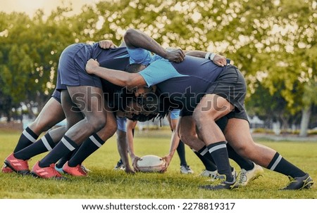 Scrum, sports and men playing rugby, catching a ball and preparing for a game on the field. Ready, together and competitive players scrumming for the start of a sport competition with contact