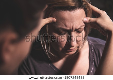 scry and telepath touch, esoteric touch and contact to the soul, woman touching the head, closeup