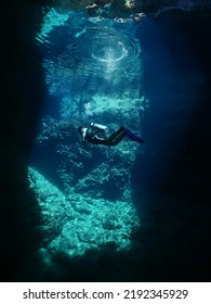 scuba diver cave dive underwater exploring blue caves ocean scenery - Shutterstock ID 2192345929