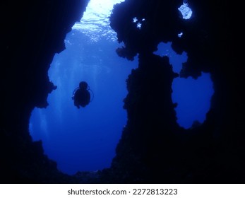 scuba diver cave dive underwater exploring blue caves ocean scenery - Shutterstock ID 2272813223