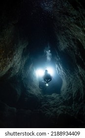 Scuba Diver Girl In The Cave.