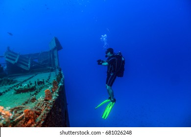 Scuba Diver On A Wreck