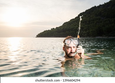 Scuba Diver Swimming In The Sea, Blowing Air Through The Snorkel, Summer Vacation Holiday Concept,cancelled Travel Plans Due To Coronavirus COVID-19 Global Pandemic Crisis,agency Refund And Money Back