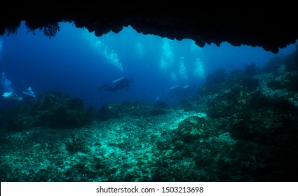 scuba diver underwater cave curacao                  - Shutterstock ID 1503213698