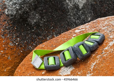 Scuba Diver Weight Belt On Granite Rock