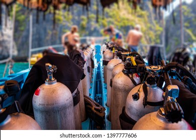 Scuba Divers Getting Ready For Diving On A Boat Full Of Equipment, Thailand