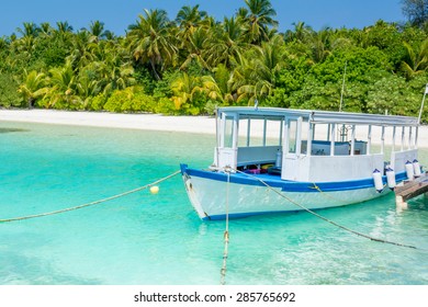 Scuba Diving Excursion Boat Docked At The Pier In Maldives