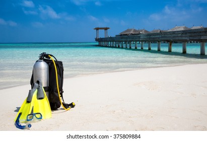 Scuba Diving Gear On A Maldivian Beach