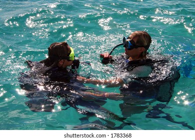 Scuba Diving Lesson With Trainee And Instructor