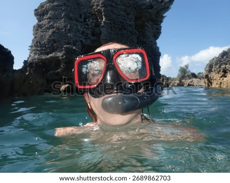 Scuba diving through the clearest Bermudian waters