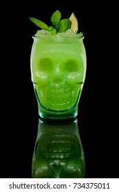 Scull Glass With Kiwi And Lemon Cocktail. Tiki Cup.