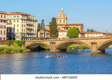 Sculling boat on the river Arno in Florence