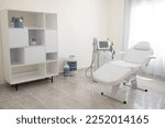 The sculp body treatment machine with a white bad in the white room, cabinet in the cosmetology, beauty center, clinic, salon.Cosmetology devices.