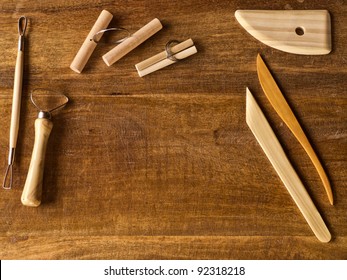 Sculpting tools on wooden table with copy space - Powered by Shutterstock