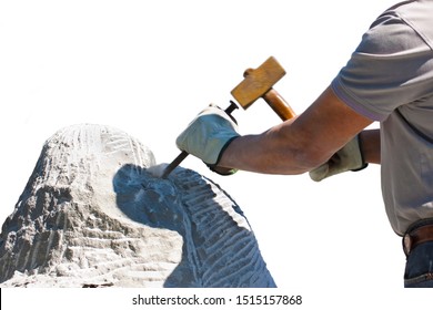 Sculptor Man At Work With Hammer And Protective Gloves To Carving A Stone Block On White Background For Easy Selection