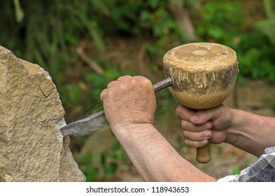 Sculptor Working On A Stone Sculpture